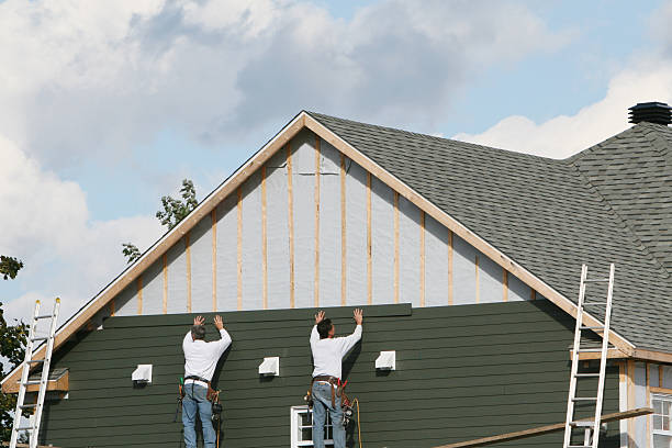 Professional Siding Replacement technician working in Timnath, CO